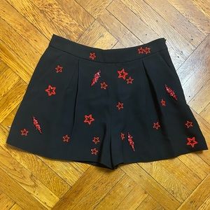 Miu Miu Black with red stars embellished shorts